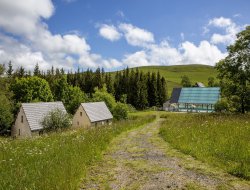 Holiday village with heated pool in Auvergne